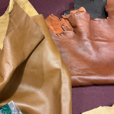 Craft leather and box of arrowheads