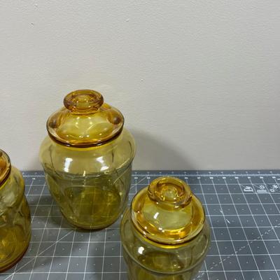 Set of Amber Glass Canisters with Lids included. (3) 