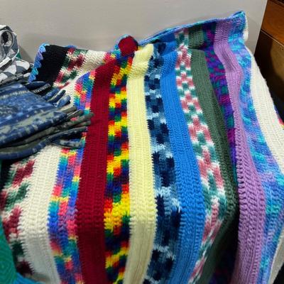 Pile of Throw Blankets both Modern and Vintage