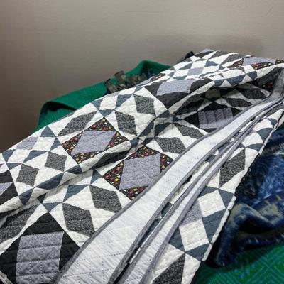 Pile of Throw Blankets both Modern and Vintage