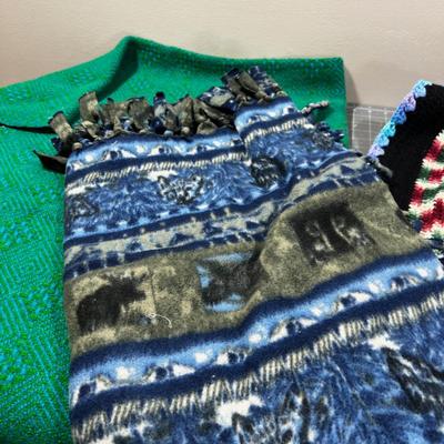 Pile of Throw Blankets both Modern and Vintage