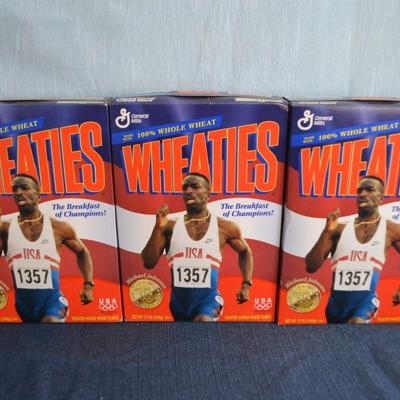 LOT 286. THREE MICHAEL JOHNSON WHEATIES BOXES (SEALED AND FULL)