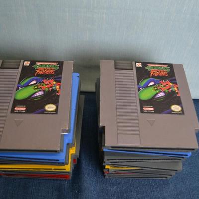 LOT 301. BOOK ENDS SIMULATED VIDEO GAME CARTRIDGES