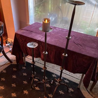 3 staggered wrought iron candle holders