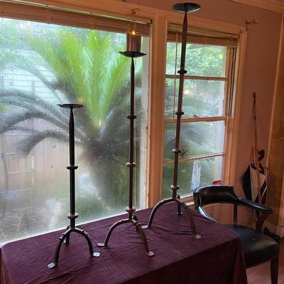 3 staggered wrought iron candle holders