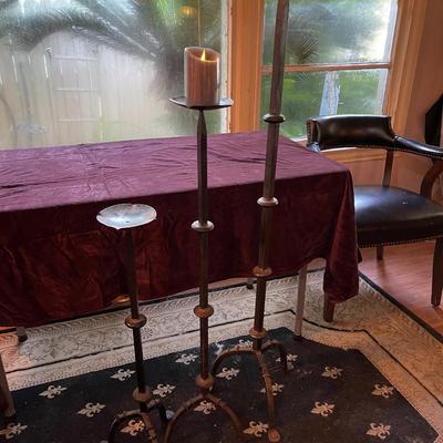 3 staggered wrought iron candle holders