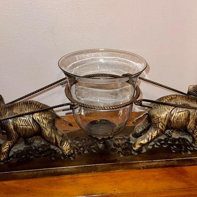 2 brass elephants with hurricane glass