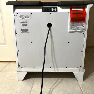 Realyn Three Drawer Nightstand