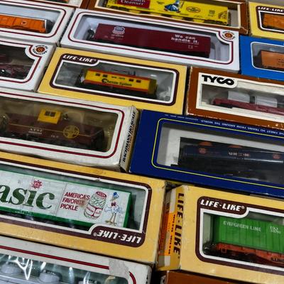 Several Train Cars Mostly new in the Box 