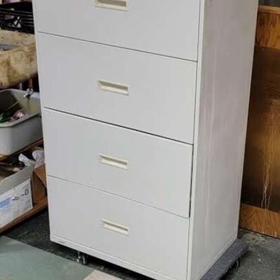 4 Drawer file cabinet with furniture mover with casters