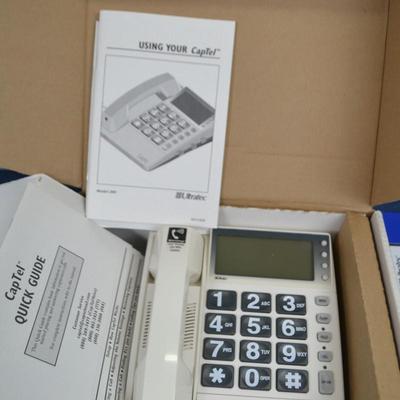 LOT 318. CAPTEL PHONE NEW IN BOX