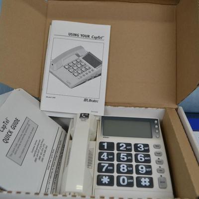 LOT 318. CAPTEL PHONE NEW IN BOX
