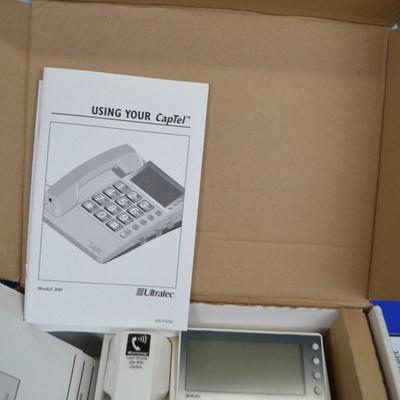 LOT 318. CAPTEL PHONE NEW IN BOX