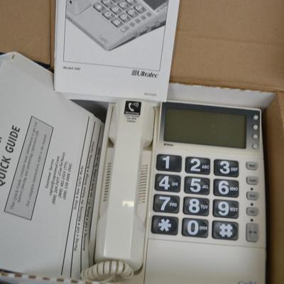 LOT 318. CAPTEL PHONE NEW IN BOX