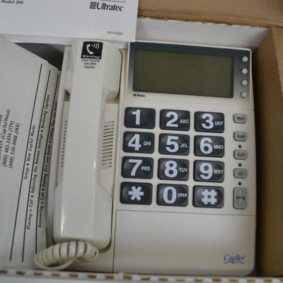 LOT 318. CAPTEL PHONE NEW IN BOX