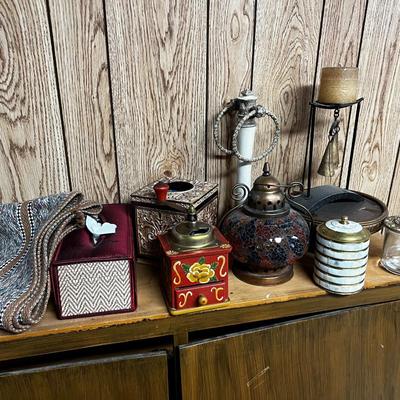 Lot of Bells, Grinder, Candle Holder and Brown Rug. 