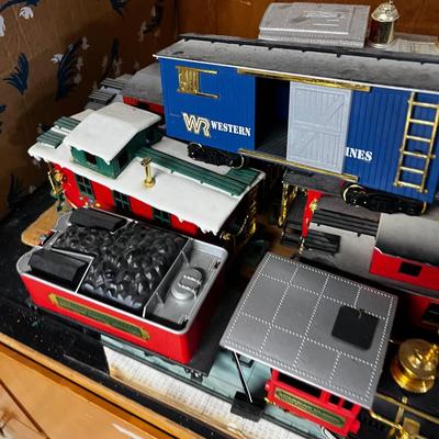 A large of Christmas Trains and Track - Several Engines 