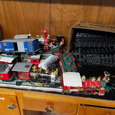 A large of Christmas Trains and Track - Several Engines 