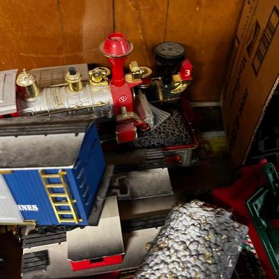 A large of Christmas Trains and Track - Several Engines 