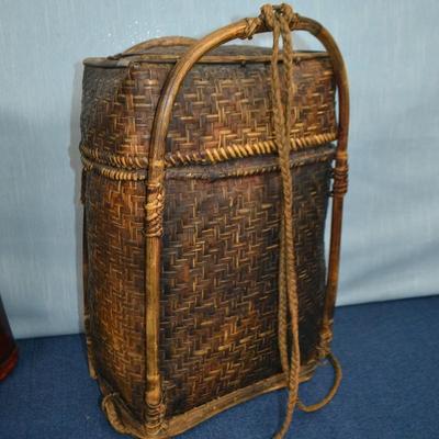 LOT 321. TALL BASKET AND HEAD REST/HOME DECOR