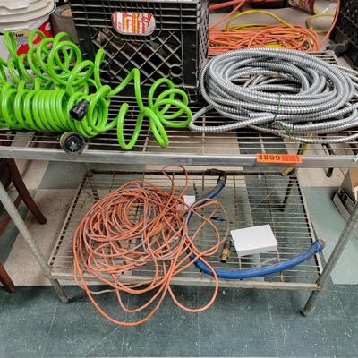 Metal rack, ext. cord, electrical wire, hose, gas hose