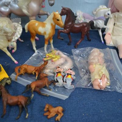 LOT 336. NURSE DOLL AND COLLECTION OF TOY HORSES