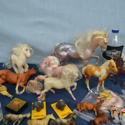 LOT 336. NURSE DOLL AND COLLECTION OF TOY HORSES