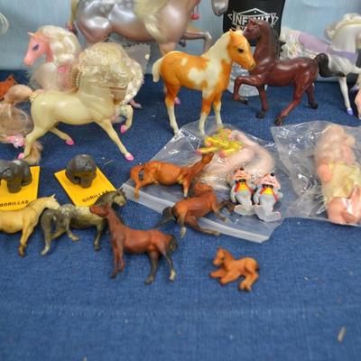 LOT 336. NURSE DOLL AND COLLECTION OF TOY HORSES