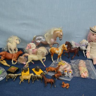 LOT 336. NURSE DOLL AND COLLECTION OF TOY HORSES