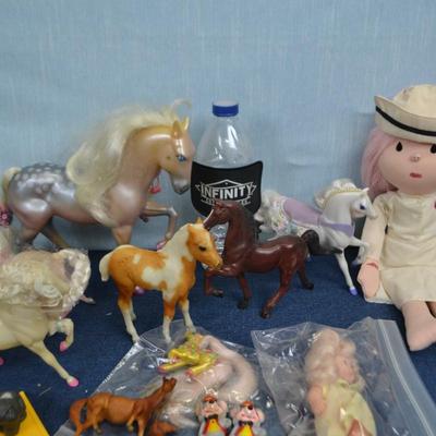 LOT 336. NURSE DOLL AND COLLECTION OF TOY HORSES