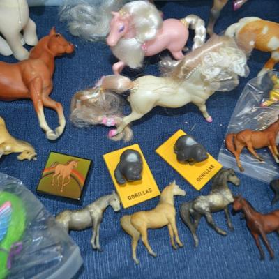 LOT 336. NURSE DOLL AND COLLECTION OF TOY HORSES