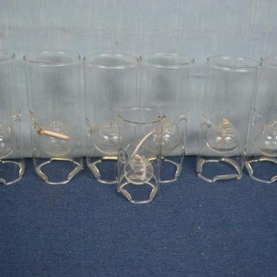 LOT 348  SEVEN GLASS OIL LAMPS