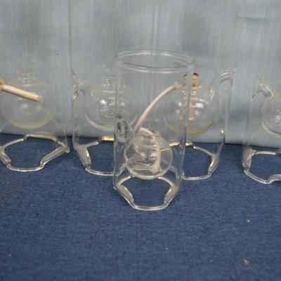 LOT 348  SEVEN GLASS OIL LAMPS