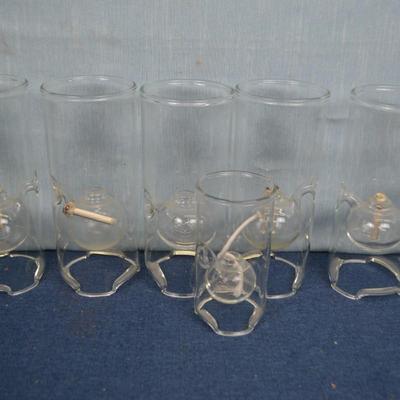 LOT 348  SEVEN GLASS OIL LAMPS