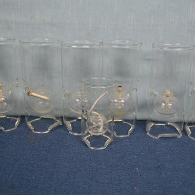 LOT 348  SEVEN GLASS OIL LAMPS