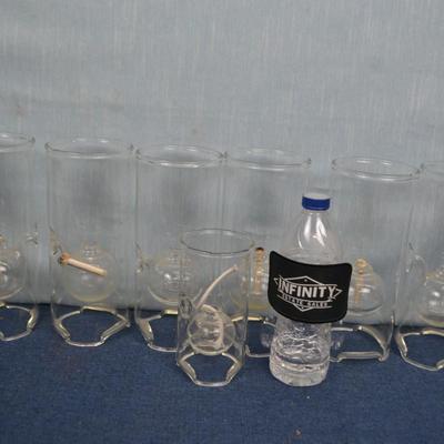 LOT 348  SEVEN GLASS OIL LAMPS