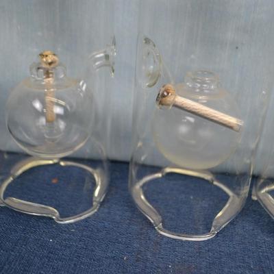 LOT 348  SEVEN GLASS OIL LAMPS