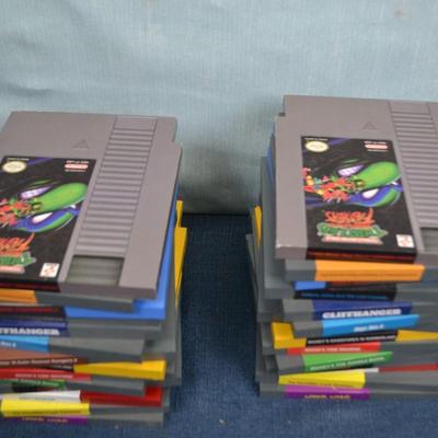 LOT 352. BOOK ENDS SIMULATED VIDEO GAME CARTRIDGES