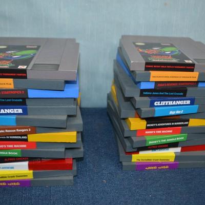 LOT 352. BOOK ENDS SIMULATED VIDEO GAME CARTRIDGES
