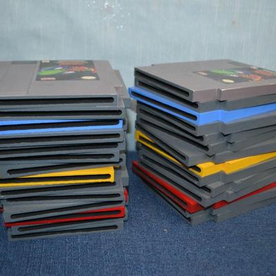 LOT 352. BOOK ENDS SIMULATED VIDEO GAME CARTRIDGES