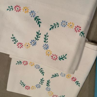 Two vintage pillow case sets