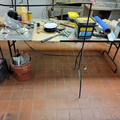 8' table with everything on top and in front of table