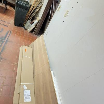 3 boxes flooring, wood and trim