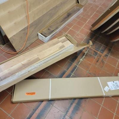 3 boxes flooring, wood and trim
