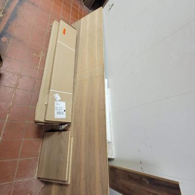 3 boxes flooring, wood and trim
