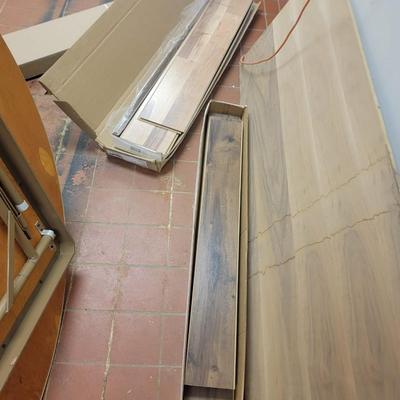 3 boxes flooring, wood and trim
