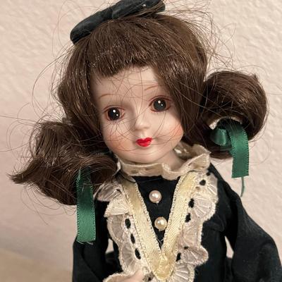 Doll in green dress musical