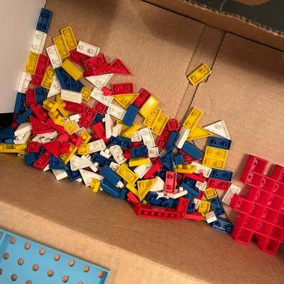Box of plastic building blocks