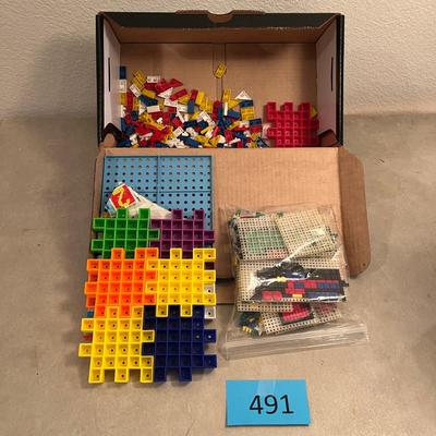 Box of plastic building blocks