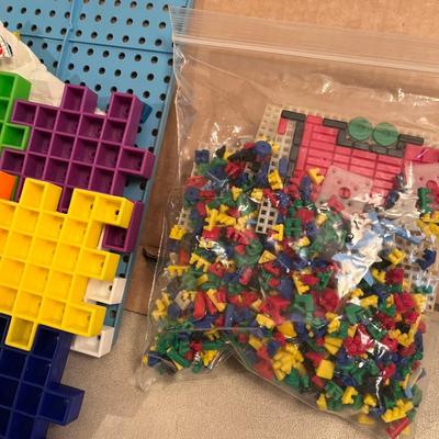 Box of plastic building blocks